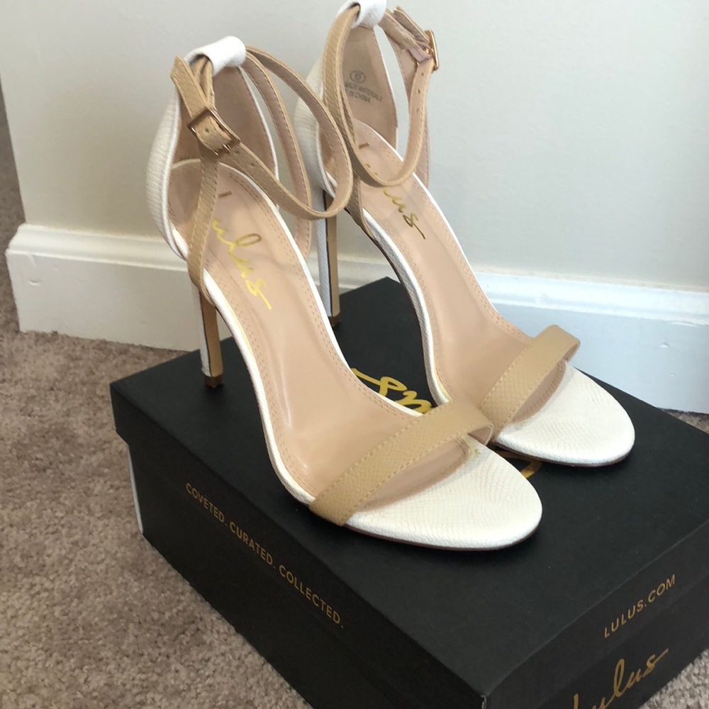 White and tan heel sandals